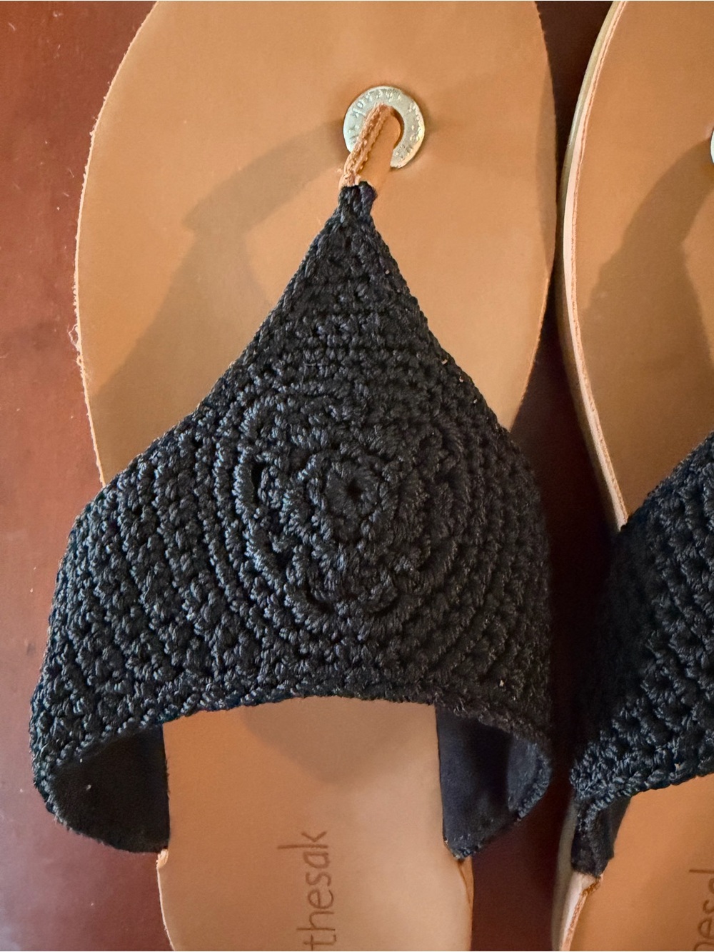 The Sak Black Crochet Thong Sandals with Tan Footbed
